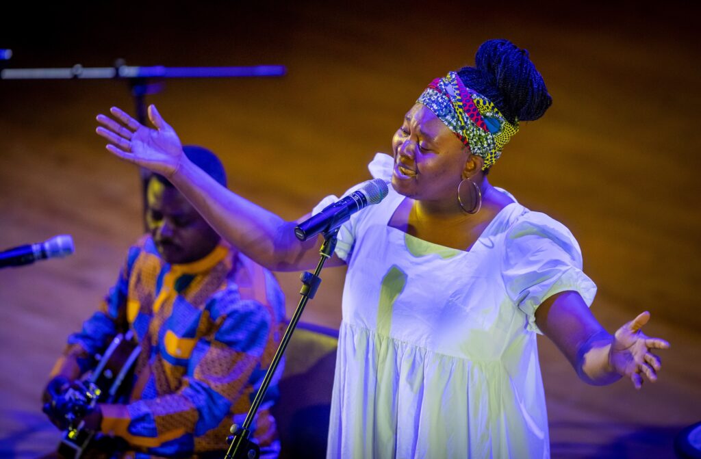 Jean Rene Balekita brings the music of Congo to the stage as he plays guitar, kora, and ndara with performers in his group as the diverse talents of the student community take the stage at Foellinger Auditorium during the third-annual Global Talent Show