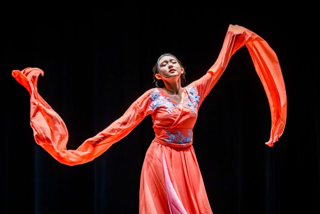 Student dancing during the fifth annual Global Talent Show at Lincoln Hall Theater