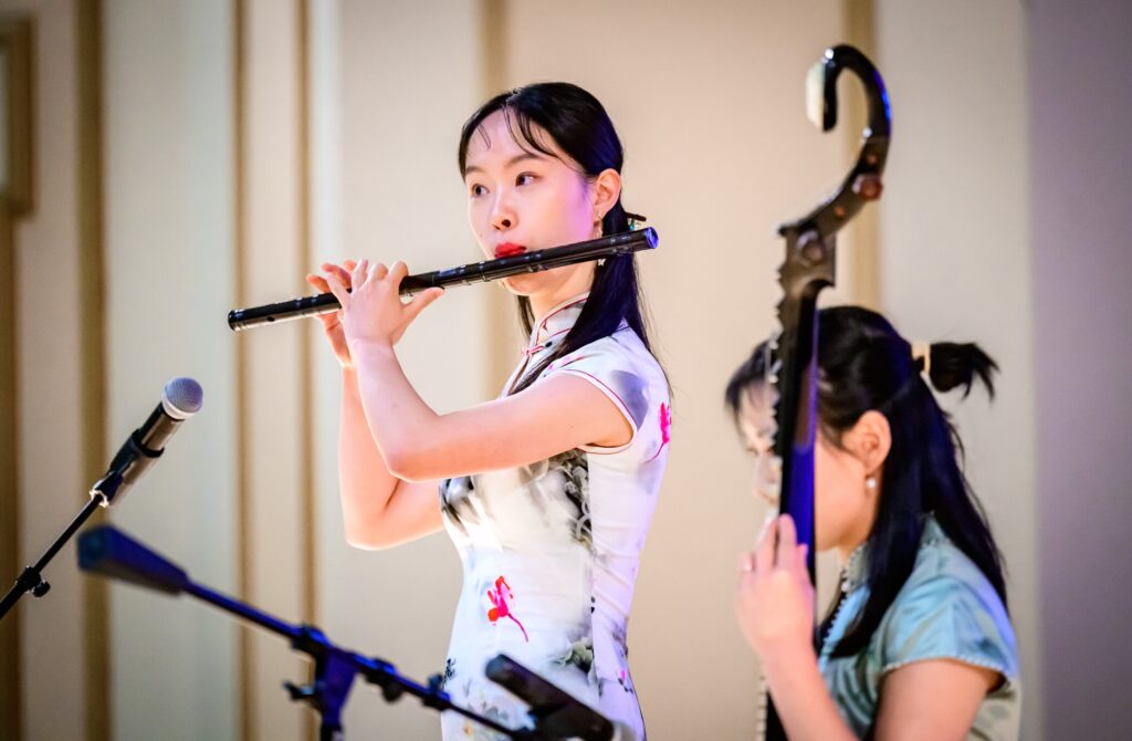 Students perform on Chinese instruments as performers share international culture and artistry during the Global Talent Show at Foellinger Auditorium