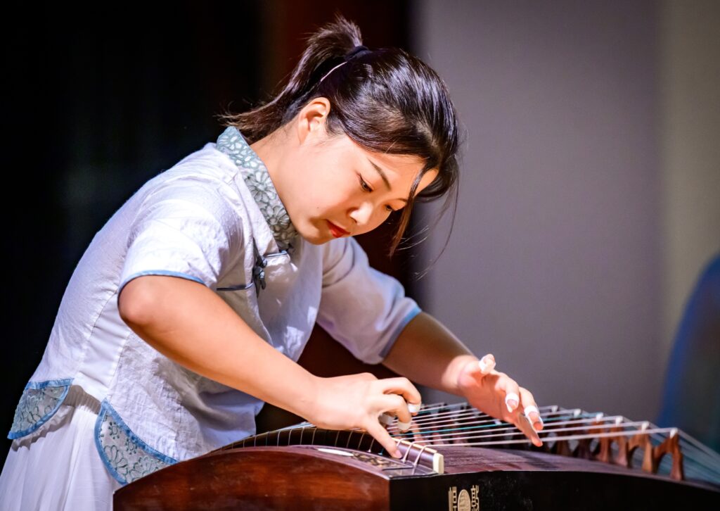 Students perform on Chinese instruments as performers share international culture and artistry during the Global Talent Show at Foellinger Auditorium